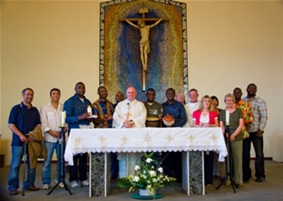 Refugees and Justice First organisers after the Mass