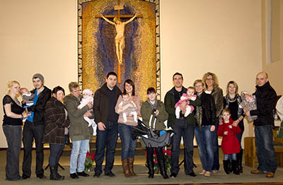 Parents with their babies and God parents who are enrolled on the first Baptism course of 2011