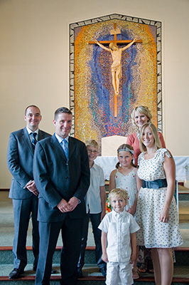 Vincent and Sarah Walsh with family after the baptism of their son
